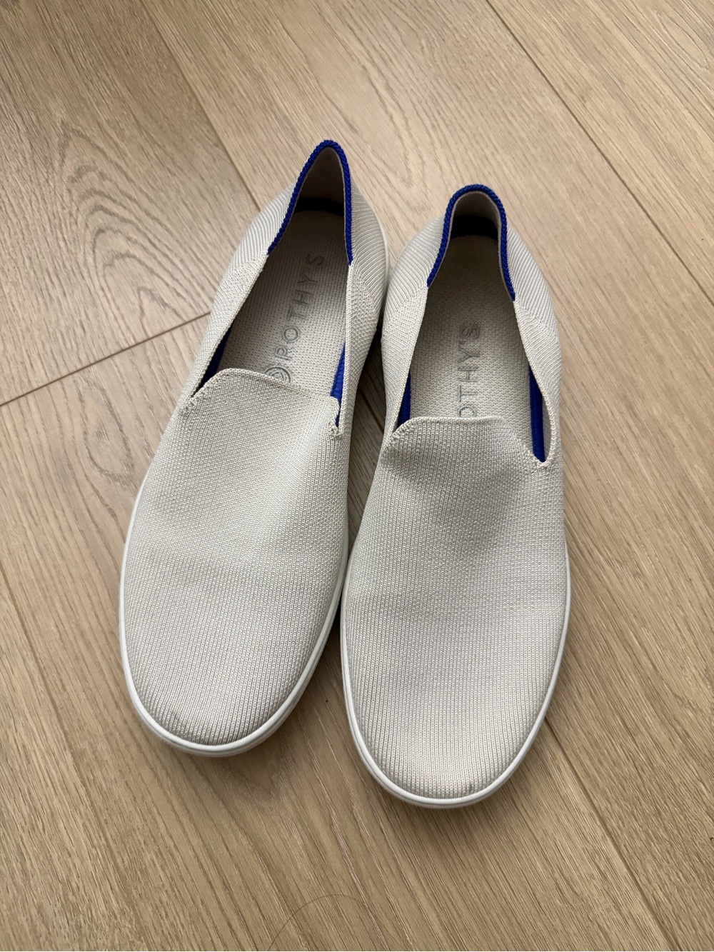 Rothy's Slip-On Loafers in Light Gray with Blue Heel Trim